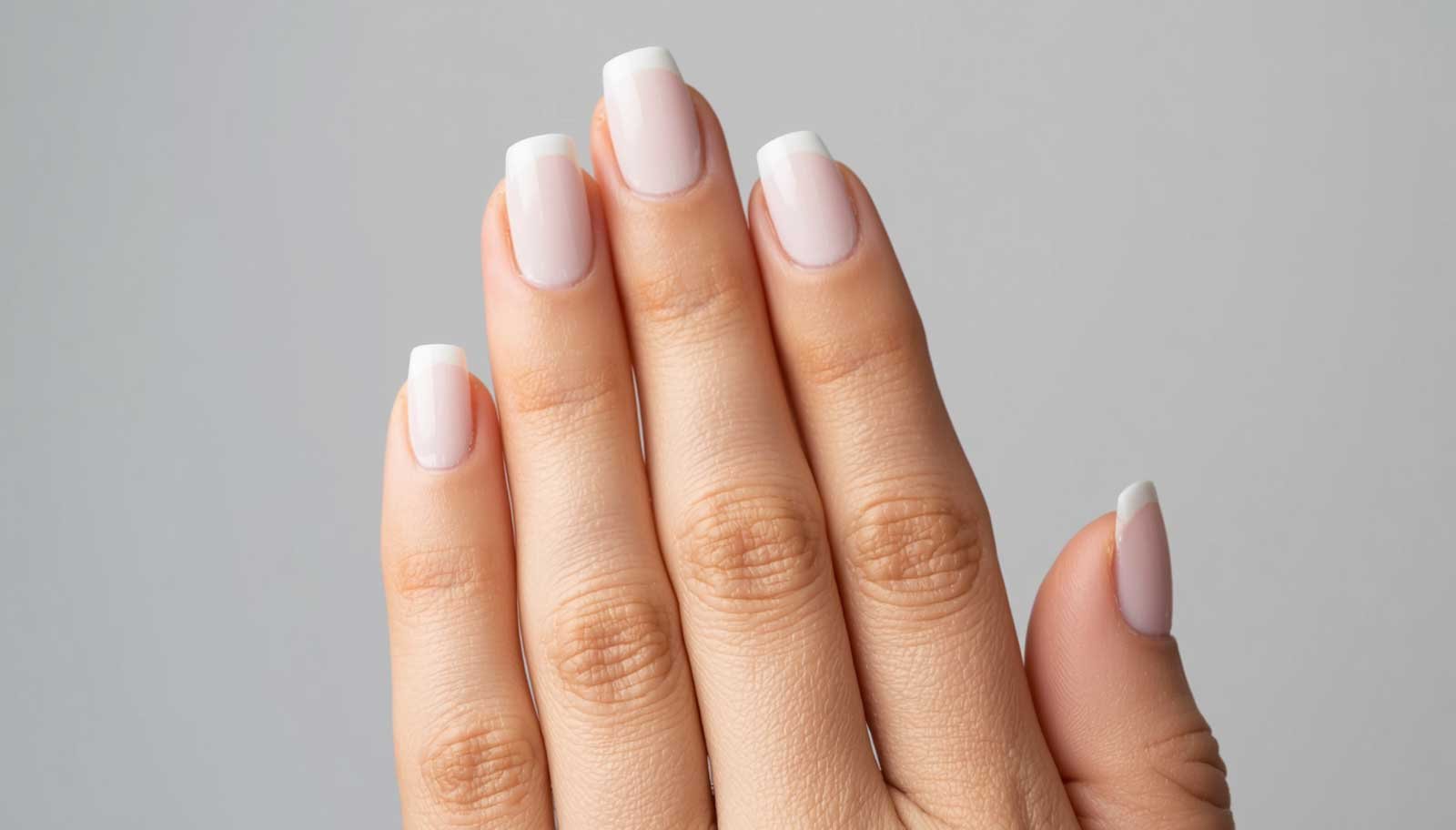 Milky White Nails: How to Get the Trend at Home vs. Salon